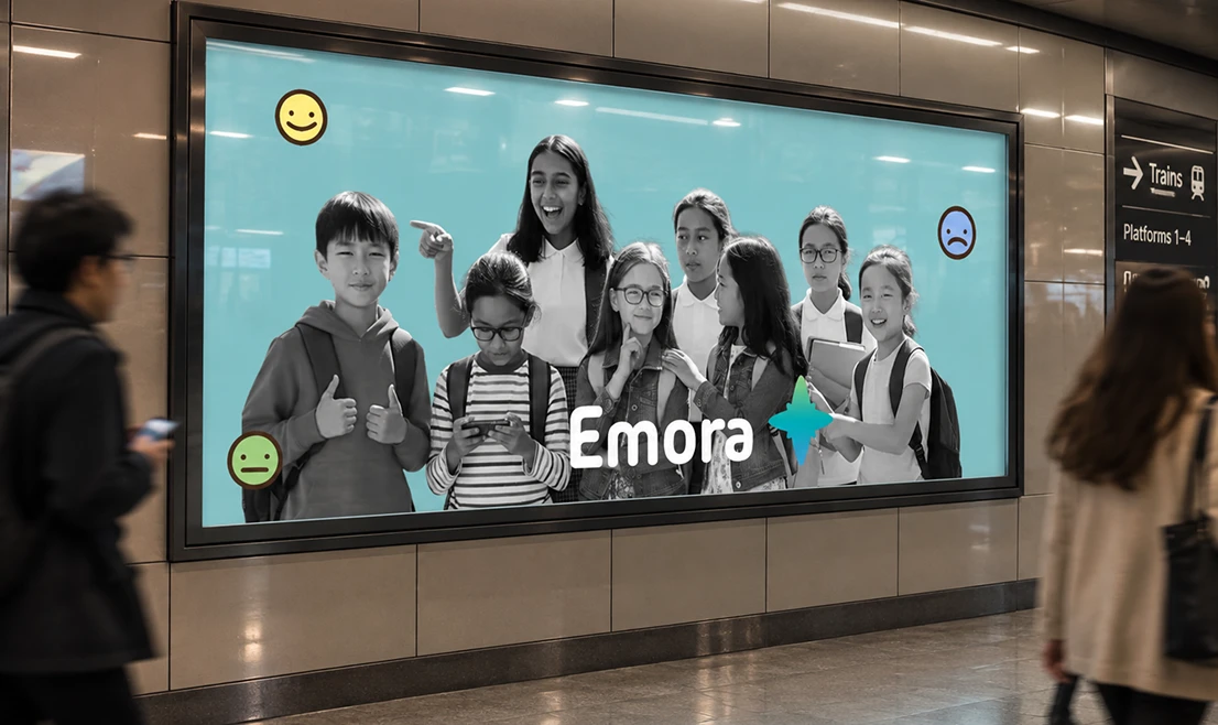 A subway billboard ad for Emora showing a group of kids with smiley, neutral, and frowny emotion icons