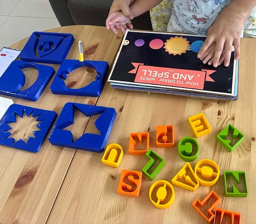Wooden letter and shape cookie-cutters designed as a sensory product for my cousin