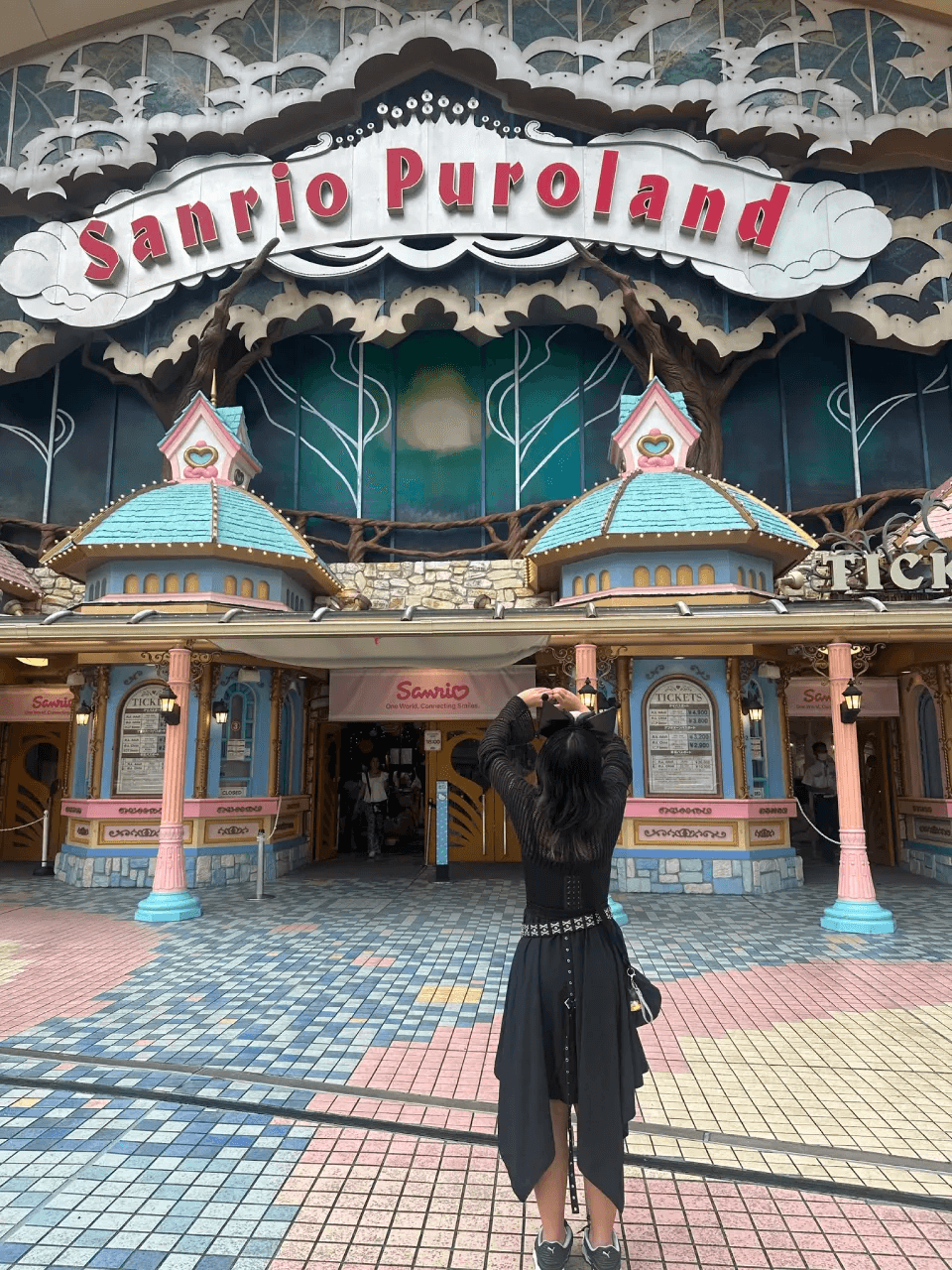 Audrey posing outside Sanrio Puroland